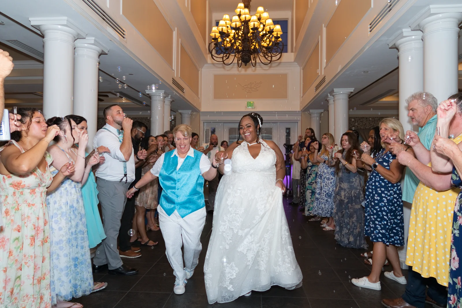 A couple celebrating with their wedding guests